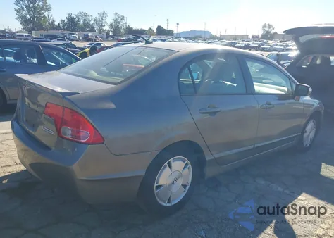 2006 Honda Civic Hybrid z USA, uszkodzony, nr VIN JHMFA362X6S027929